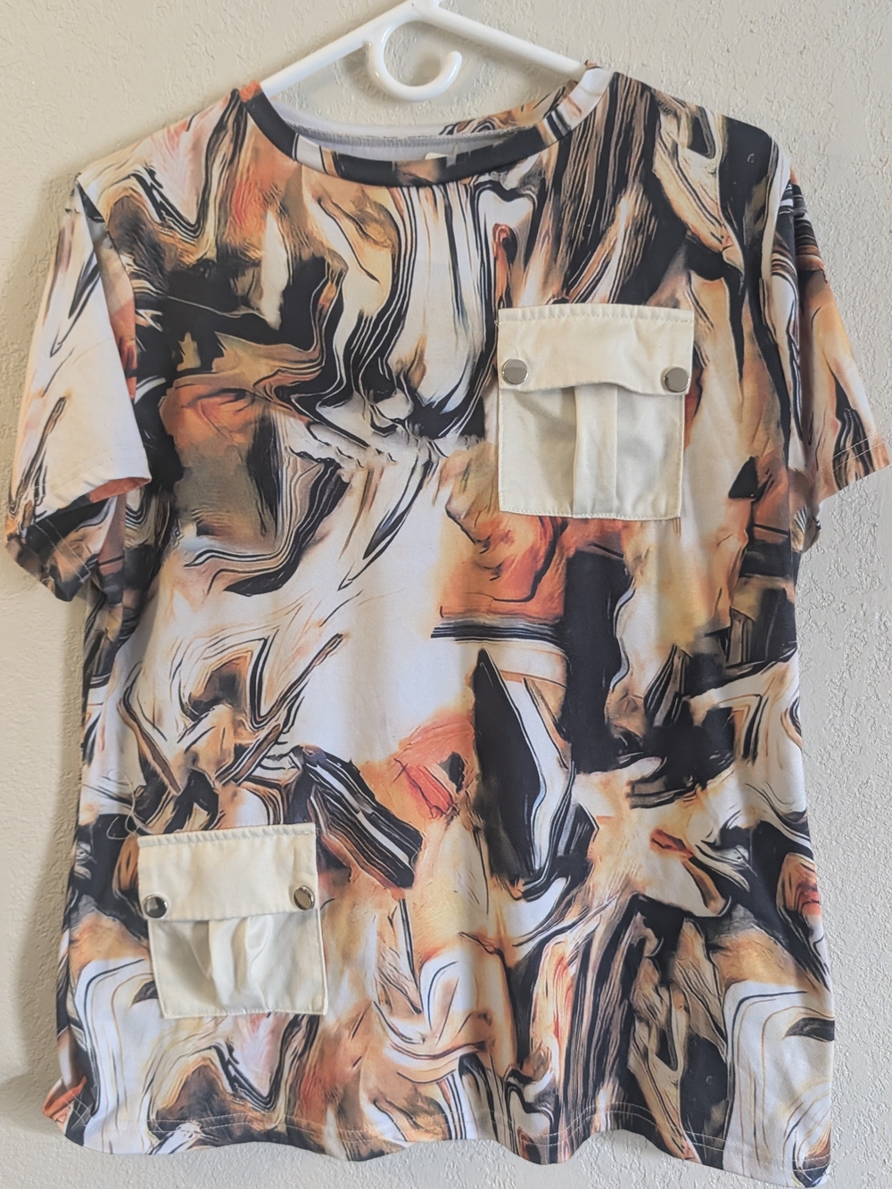 Womens Short Sleeve Marble-Print Pocket Tee in Cream, Black & Orange